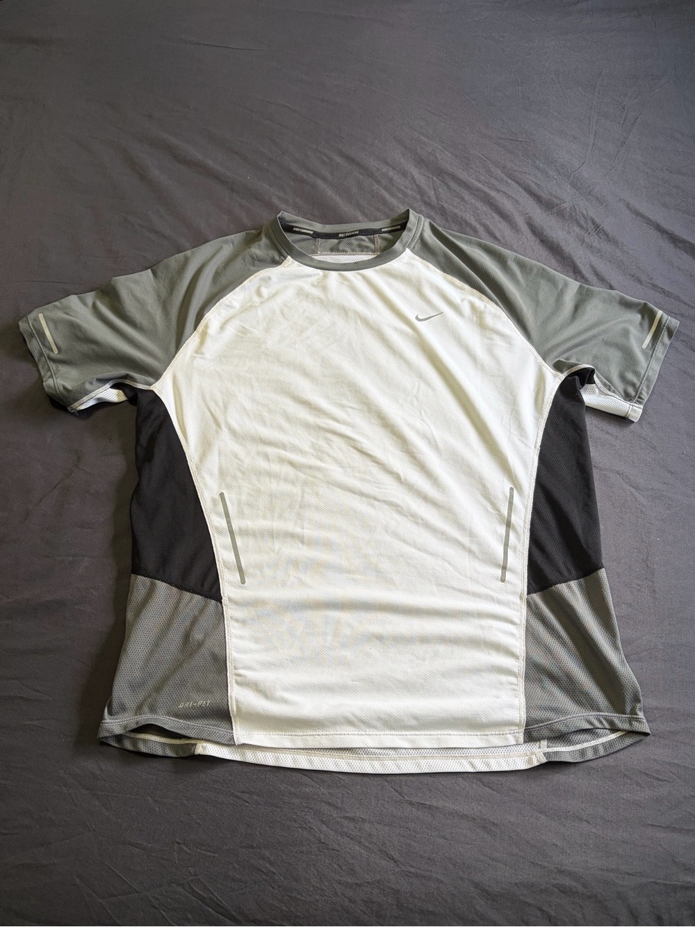 Nike Dri-Fit white, black, and gray color-blocked running shirt. Size L.